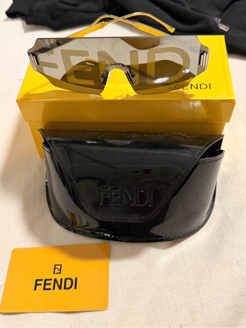 Fendi Shield Sunglasses with Yellow Accents and Brown Lenses